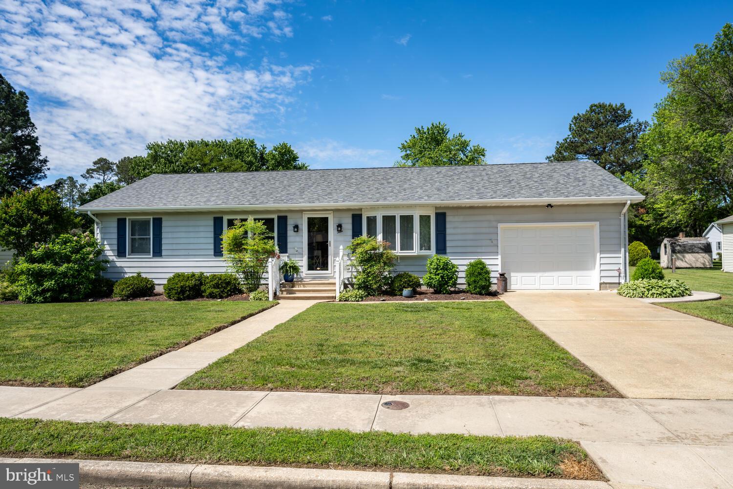 front view of a house and a yard