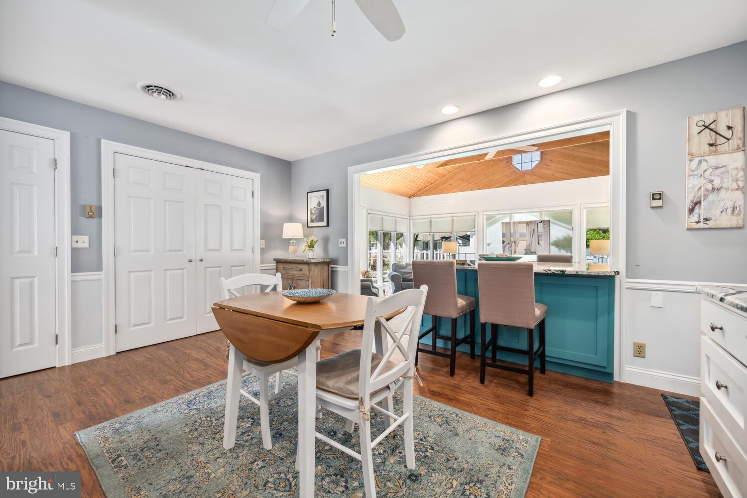 3 Oriole Drive Cambridge, MD 21613 - Photo 14 of 46 a dining room with furniture and wooden floor