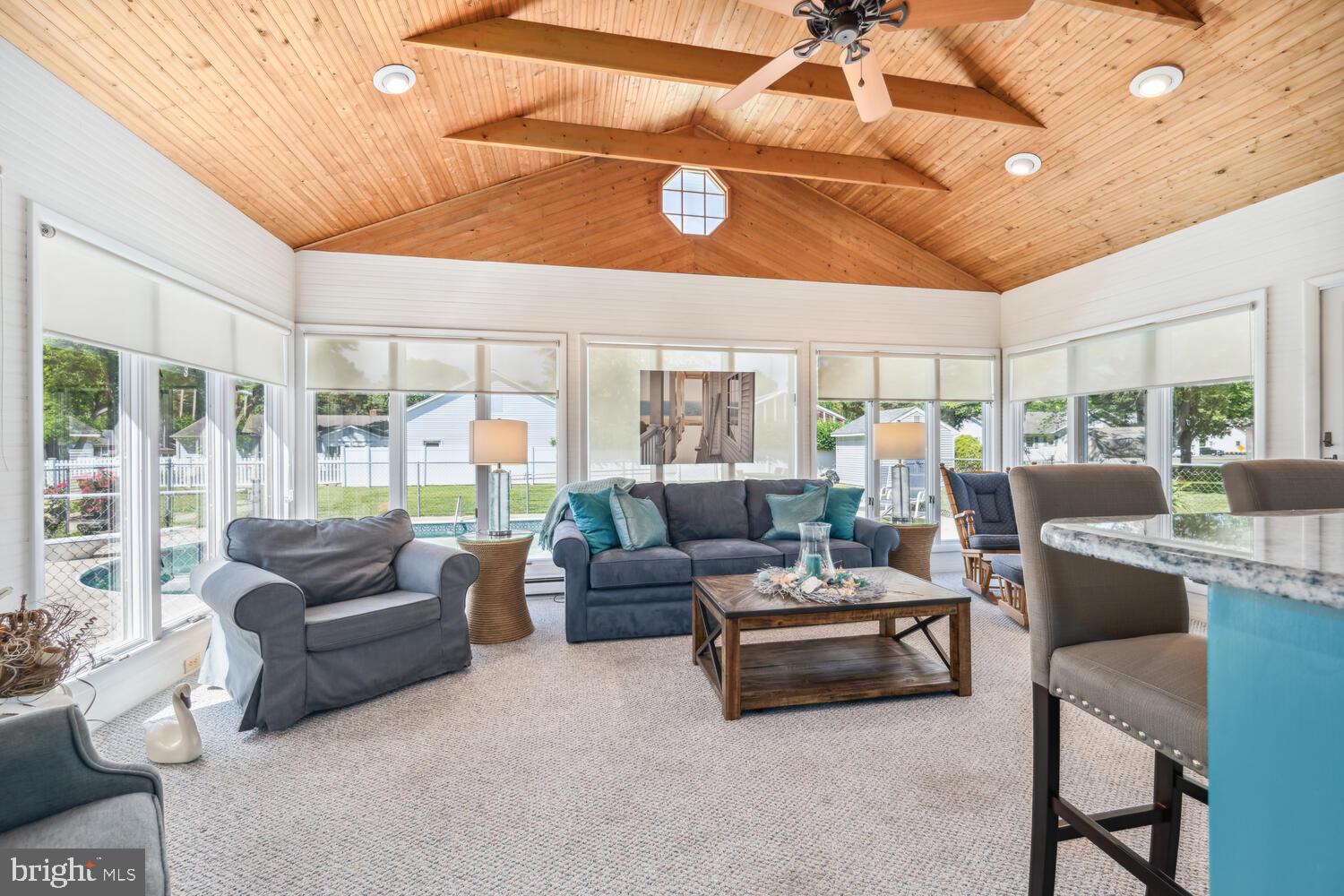 3 Oriole Drive Cambridge, MD 21613 - Photo 15 of 46 a living room with furniture and a large window