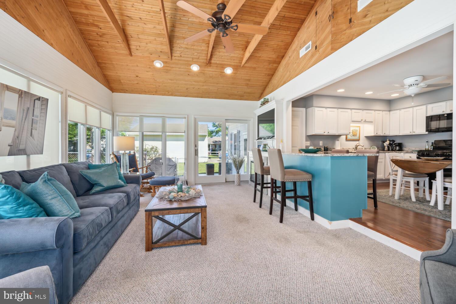 3 Oriole Drive Cambridge, MD 21613 - Photo 17 of 46 a living room with furniture and a large window