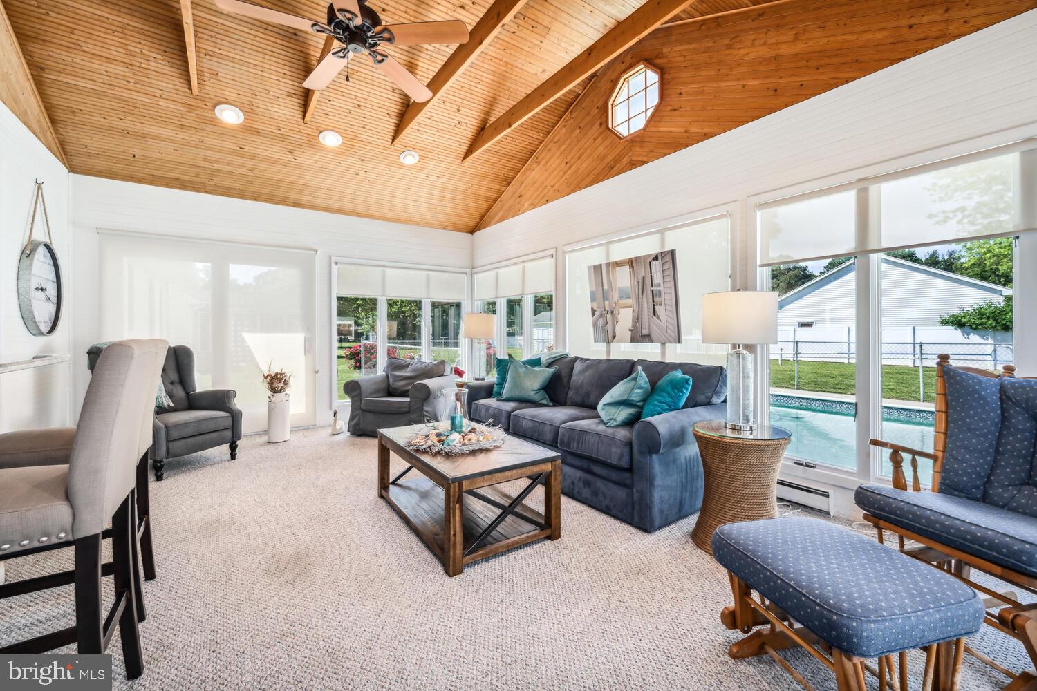 3 Oriole Drive Cambridge, MD 21613 - Photo 19 of 46 a living room with furniture and a large window