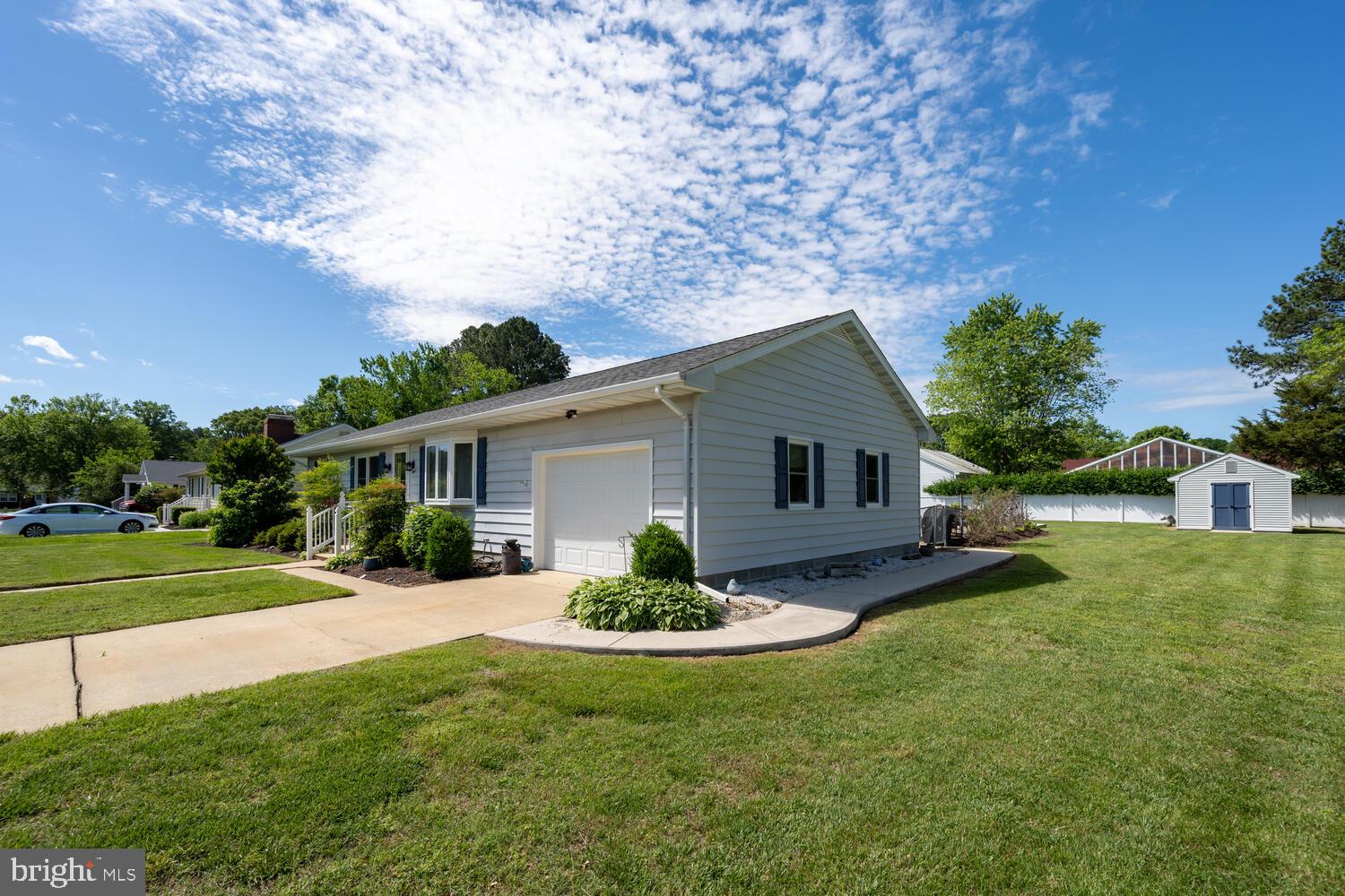 3 Oriole Drive Cambridge, MD 21613 - Photo 2 of 46 a house view with a garden space and street view