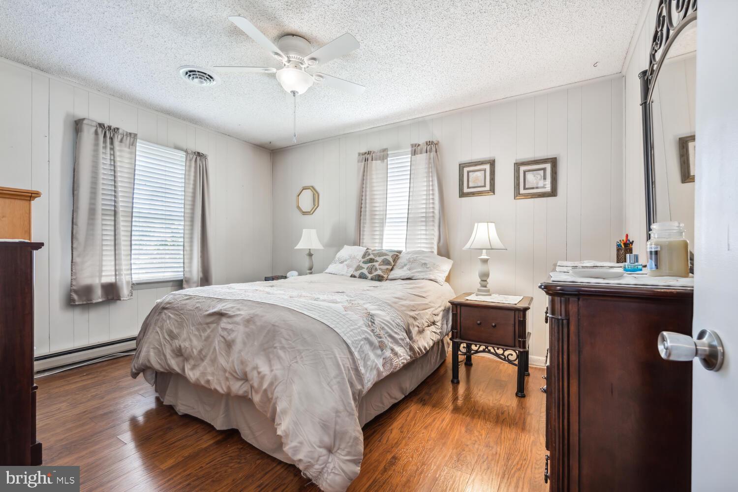 3 Oriole Drive Cambridge, MD 21613 - Photo 22 of 46 a bedroom with a bed and a table