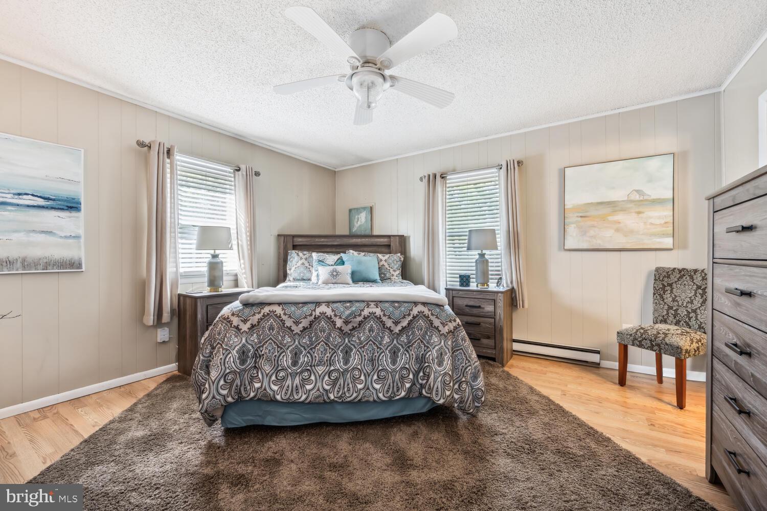 3 Oriole Drive Cambridge, MD 21613 - Photo 24 of 46 a bedroom with a bed a table and chair