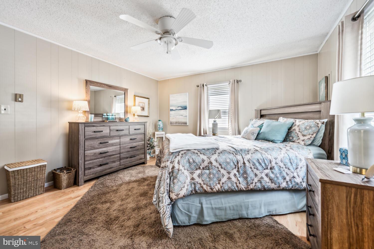 3 Oriole Drive Cambridge, MD 21613 - Photo 26 of 46 a bedroom with a bed and furniture