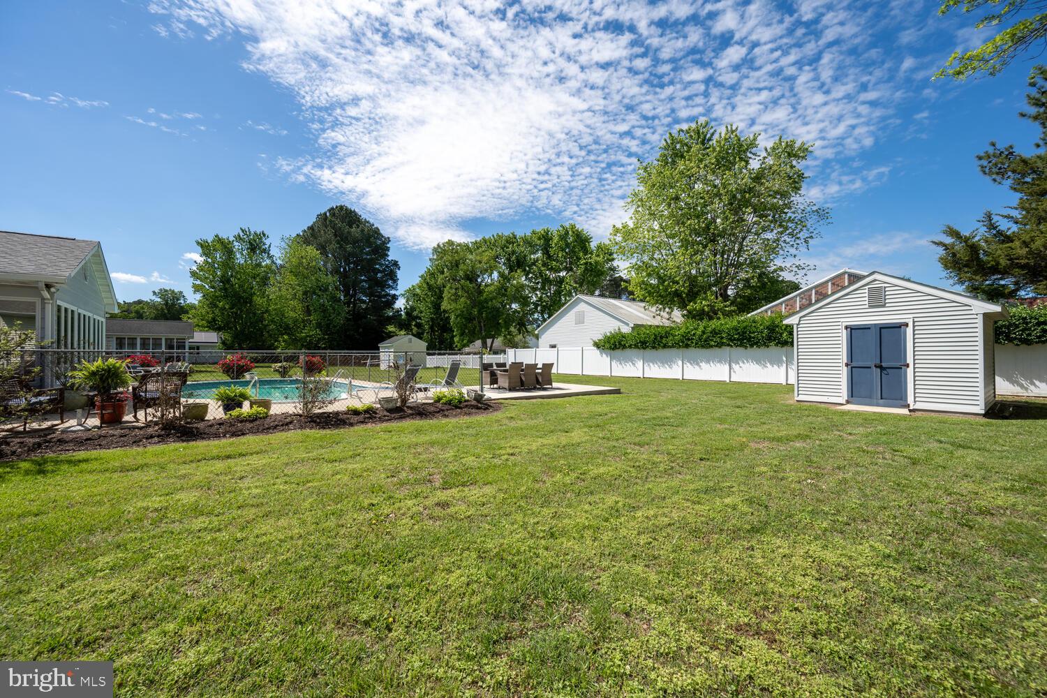 3 Oriole Drive Cambridge, MD 21613 - Photo 29 of 46 a view of a house with backyard and sitting area