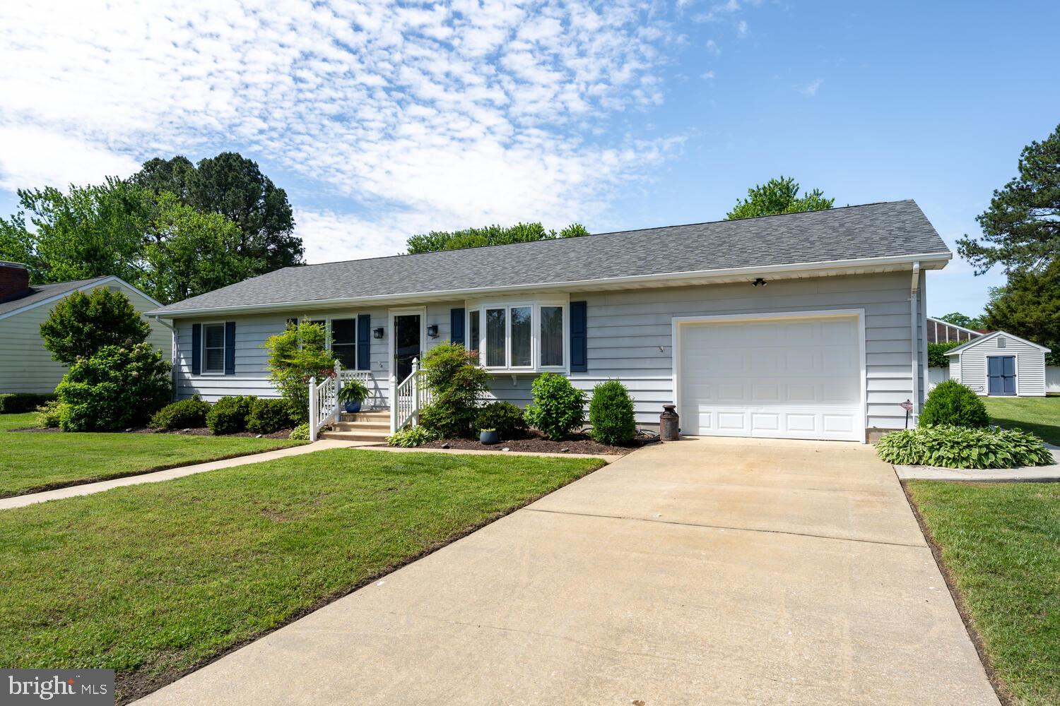 3 Oriole Drive Cambridge, MD 21613 - Photo 30 of 46 a front view of a house with a yard