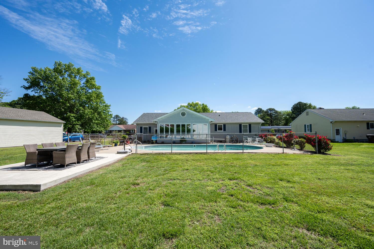 3 Oriole Drive Cambridge, MD 21613 - Photo 3 of 46 a view of a house with swimming pool and sitting area