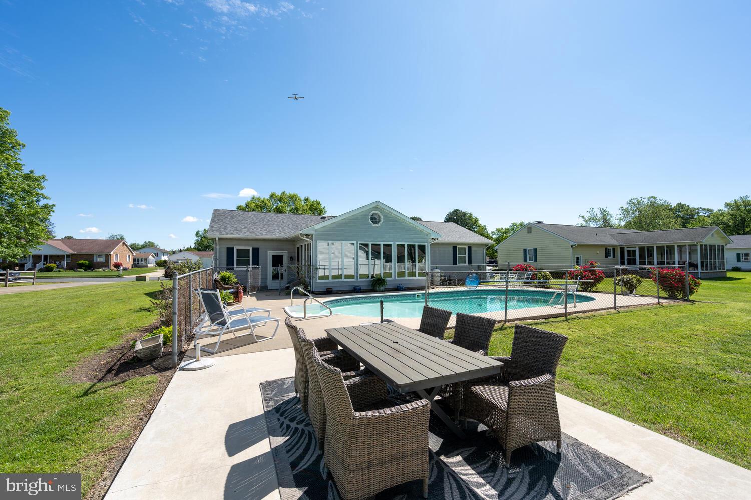 3 Oriole Drive Cambridge, MD 21613 - Photo 32 of 46 a view of a house with swimming pool and sitting area