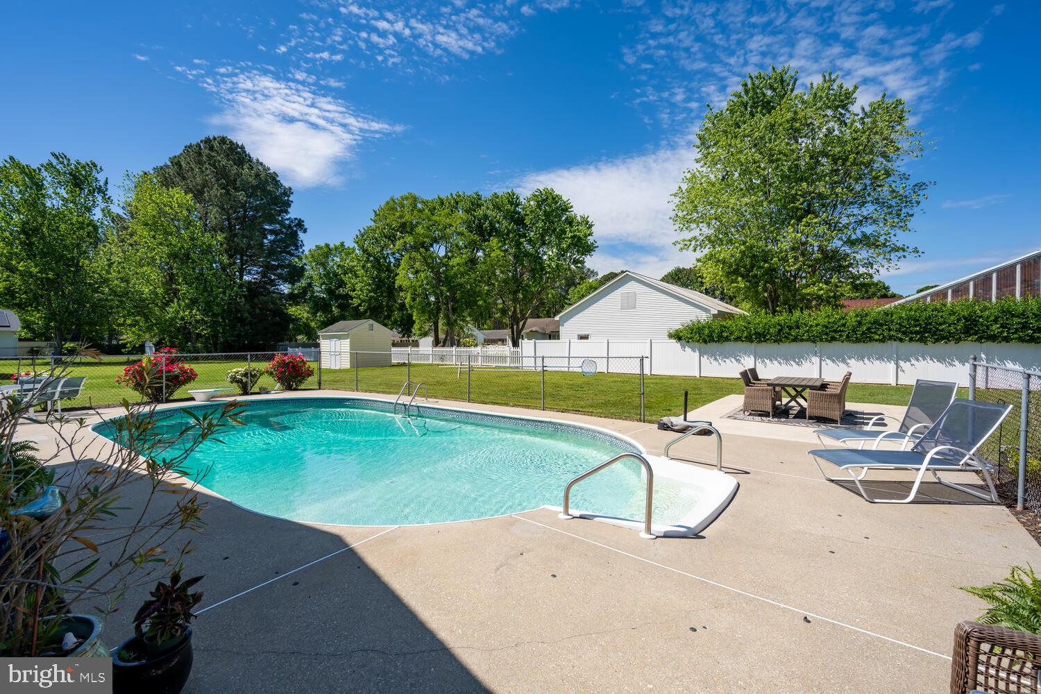 3 Oriole Drive Cambridge, MD 21613 - Photo 33 of 46 an outdoor space with swimming pool and furniture