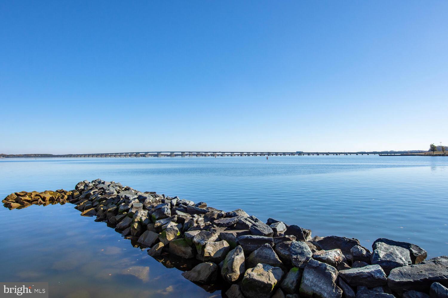 3 Oriole Drive Cambridge, MD 21613 - Photo 38 of 46 a view of a bunch of cars parked on road with ocean view