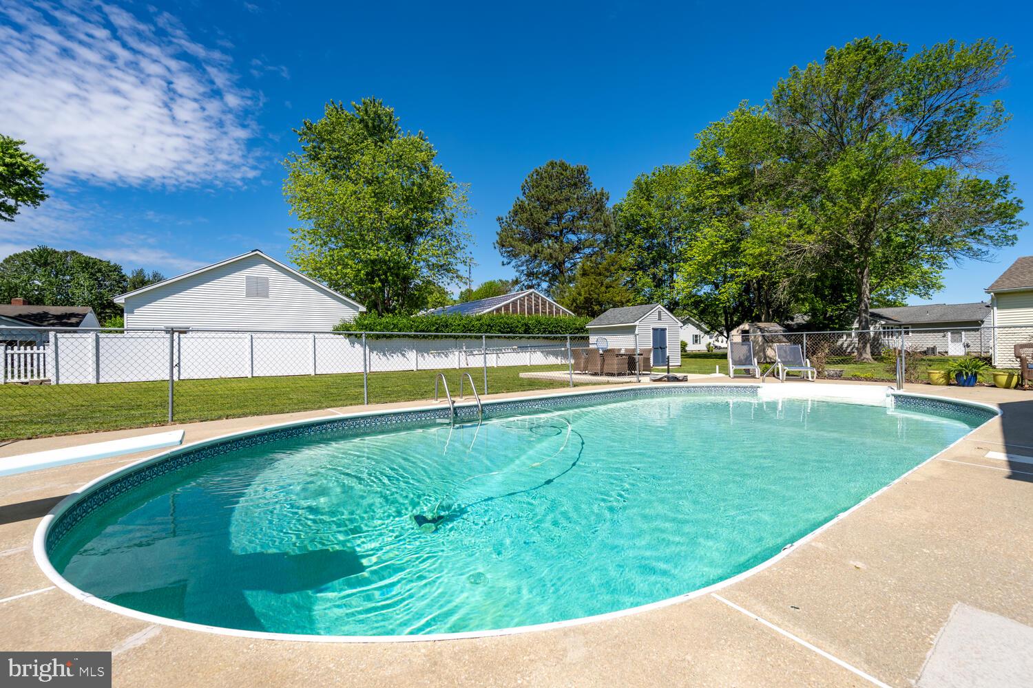 3 Oriole Drive Cambridge, MD 21613 - Photo 4 of 46 a view of a swimming pool with a yard