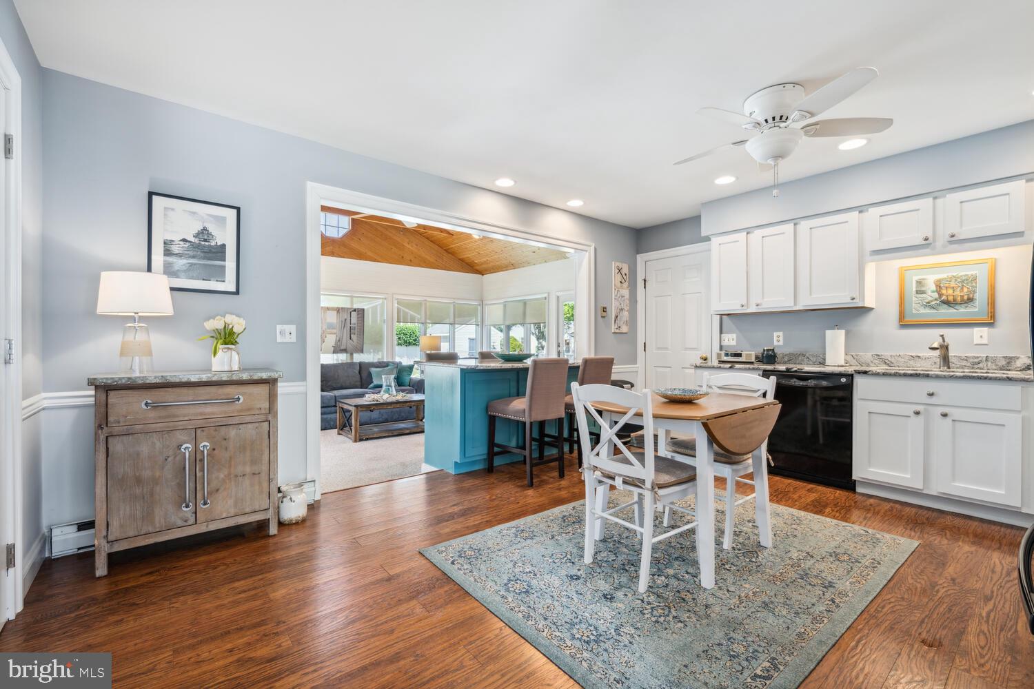 3 Oriole Drive Cambridge, MD 21613 - Photo 10 of 46 a view of a dining room with furniture and wooden floor