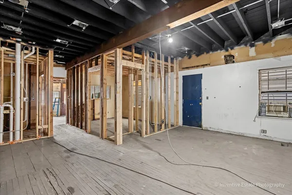 a view of a garage room with stairs