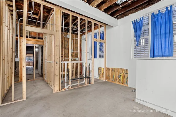 a view of a room with wooden walls