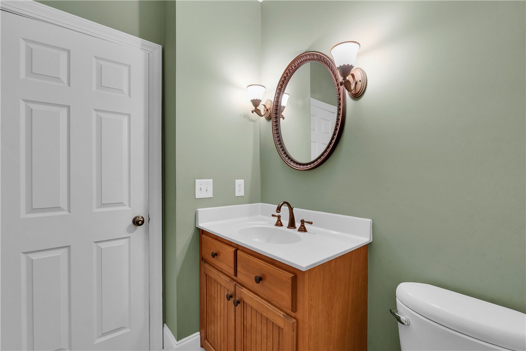 406 Hopewell Ridge Anderson, SC 29621 - Photo 16 of 46 This bathroom features a single vanity with a sleek countertop, offering both functionality and elegance.