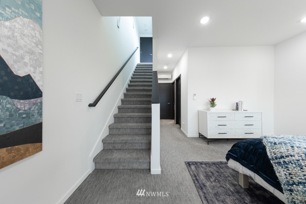 744 North 95th Street, Unit B Seattle, WA 98103 - Photo 19 of 28 a view of hall way with furniture and stairs