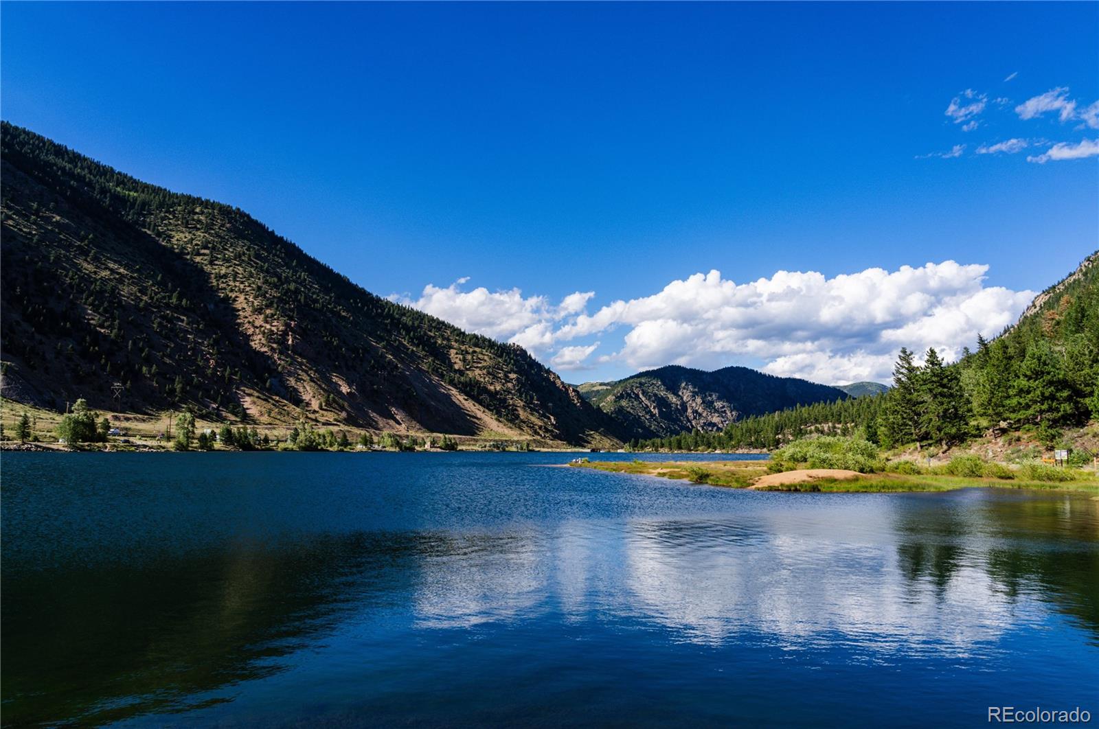 2152 Bighorn Road, Unit 204 Georgetown, CO 80444 - Photo 26 of 36 a view of a lake with outside seating space