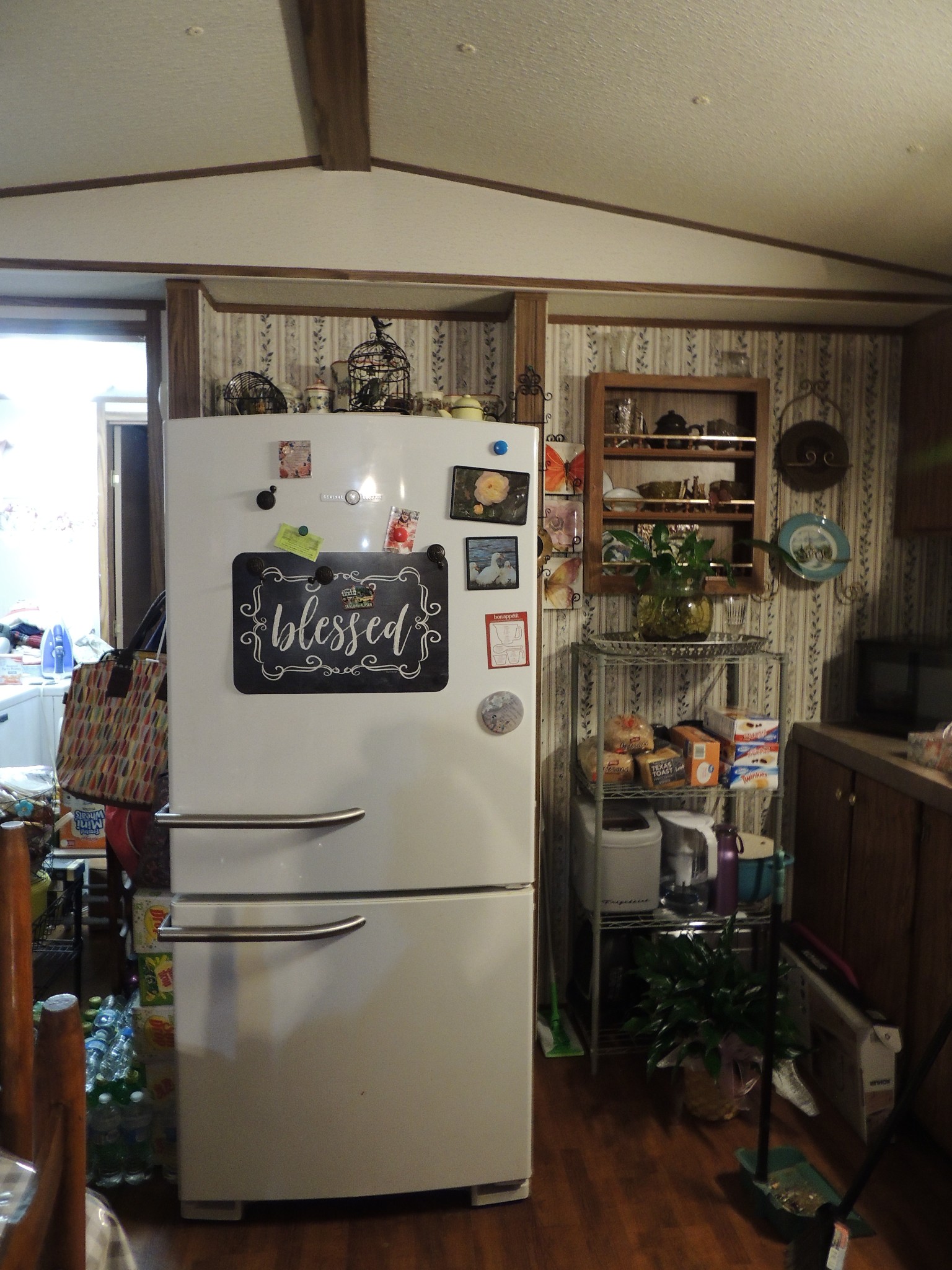 3329 Fall River Road Pulaski, TN 38478 - Photo 6 of 12 a white refrigerator freezer sitting in a kitchen