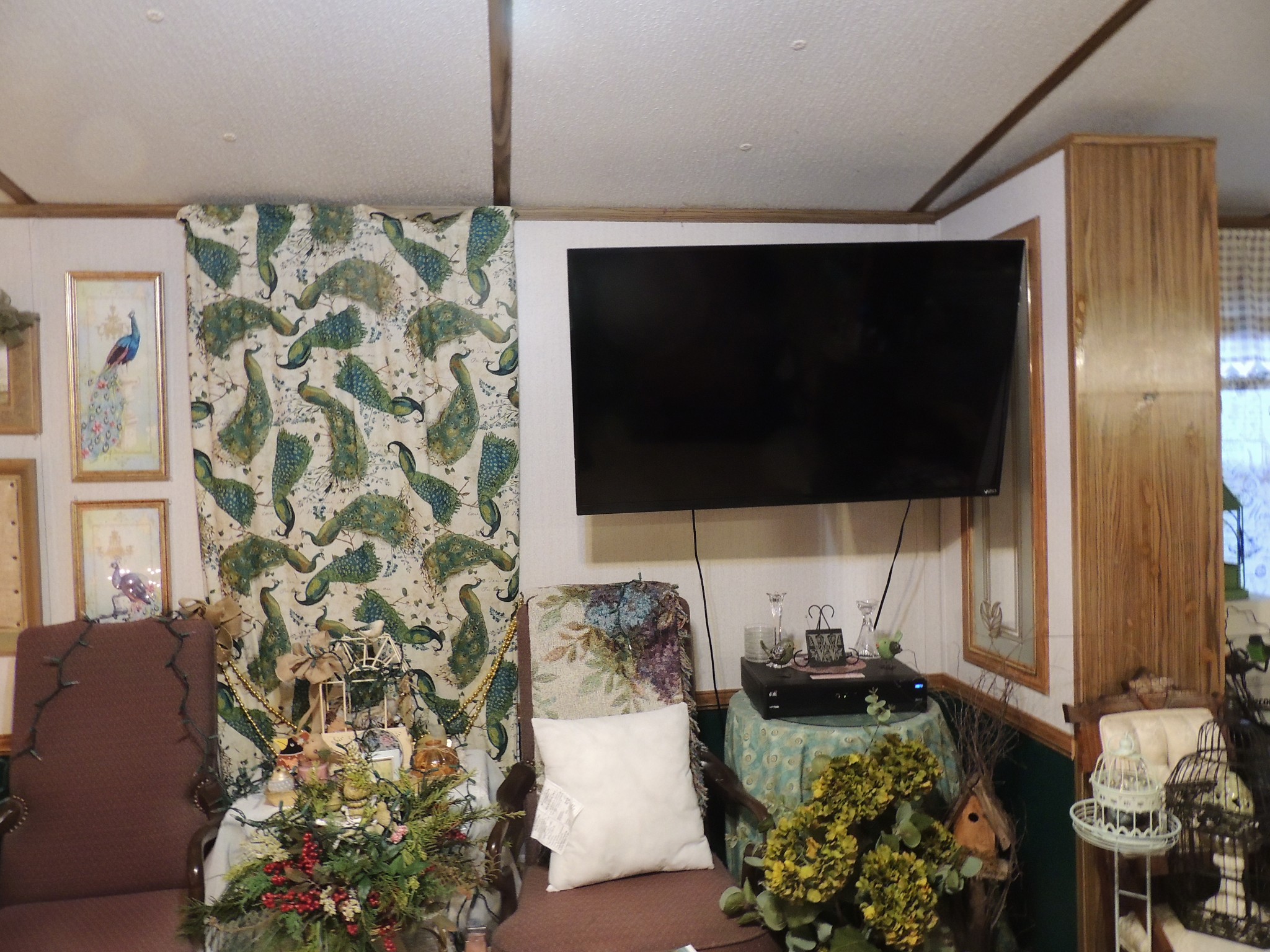 3329 Fall River Road Pulaski, TN 38478 - Photo 8 of 12 a living room with a couch and a flat screen tv