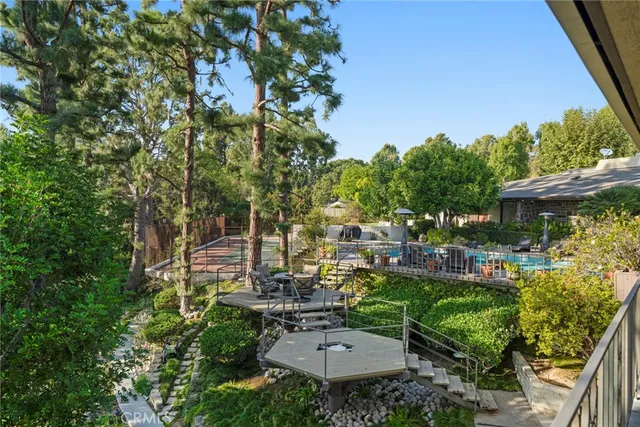 a bathroom with a shower a toilet and sink