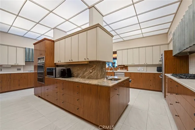 a swimming pool with outdoor seating