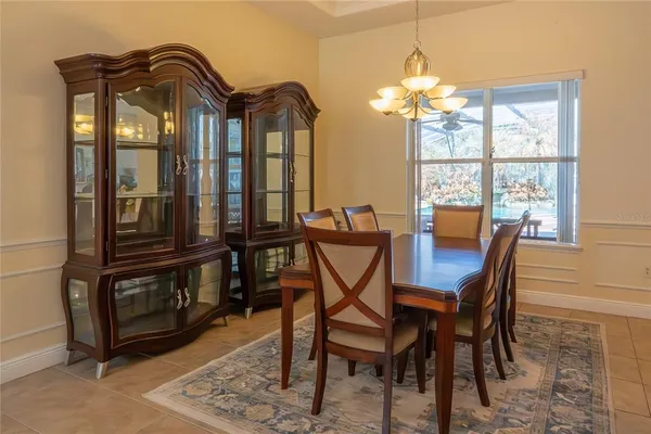 a bedroom with a bed and a cabinet