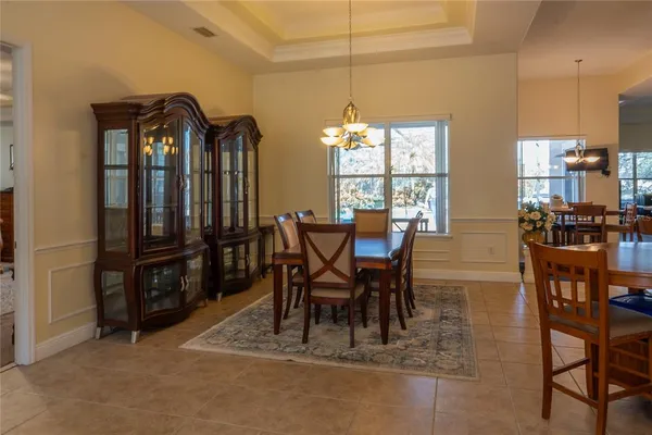 a view of a dining room with furniture