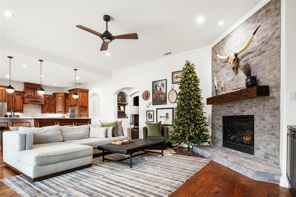 700 Frenchtown Road Argyle, TX 76226 - Photo 15 of 40 Living room features an impressive floor to ceiling fireplace and open to the kitchen and breakfast area,