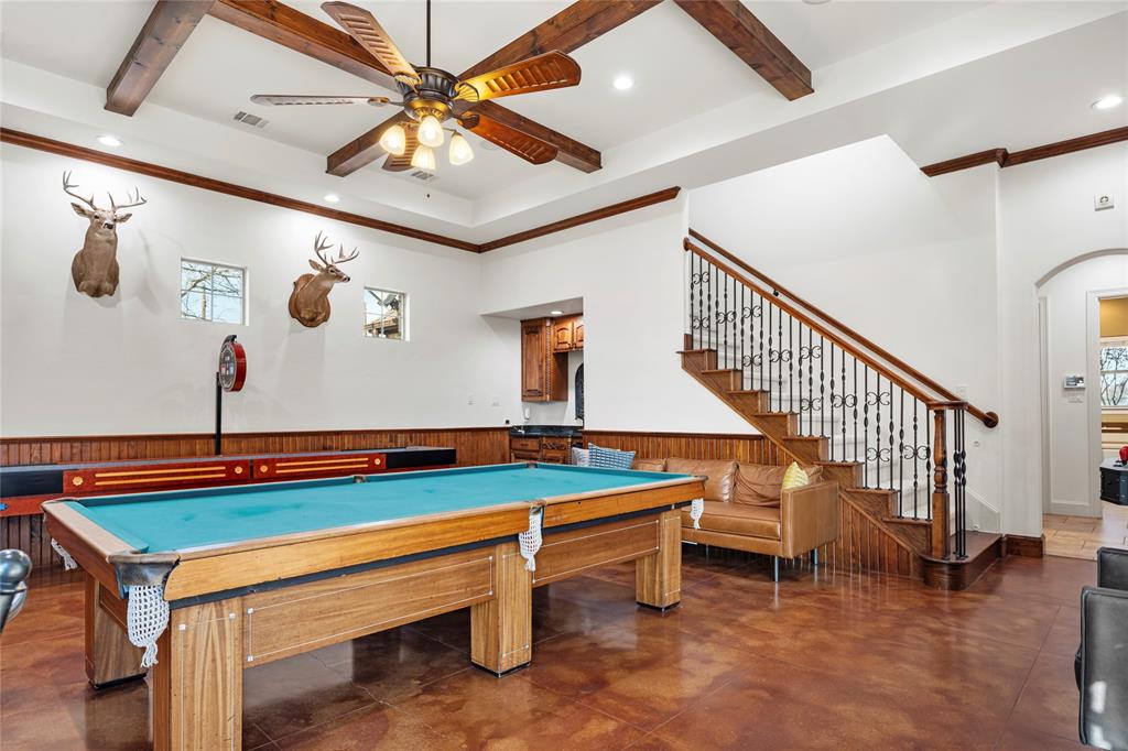 700 Frenchtown Road Argyle, TX 76226 - Photo 23 of 40 Entertain family and friends in this awesome game room with wet bar and lots of space for table and video games.
