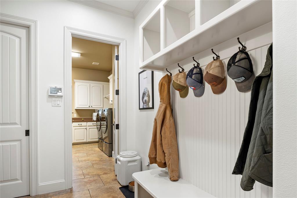 700 Frenchtown Road Argyle, TX 76226 - Photo 25 of 40 Well appointed Mudroom area coming in from 3 car garage conveniently located next to massive Laundry room.