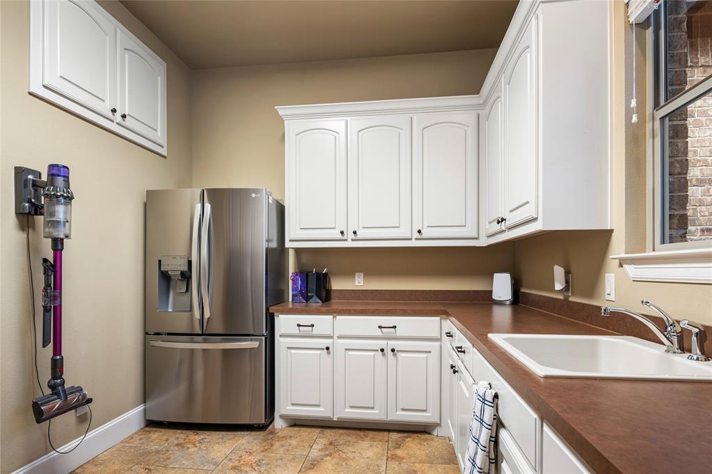 700 Frenchtown Road Argyle, TX 76226 - Photo 27 of 40 Room for extra fridge of freezer in the Laundry room.