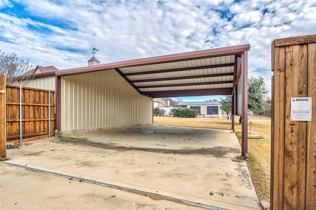 700 Frenchtown Road Argyle, TX 76226 - Photo 39 of 40 Attached Carport with automatic gated entry features RV Hook up.