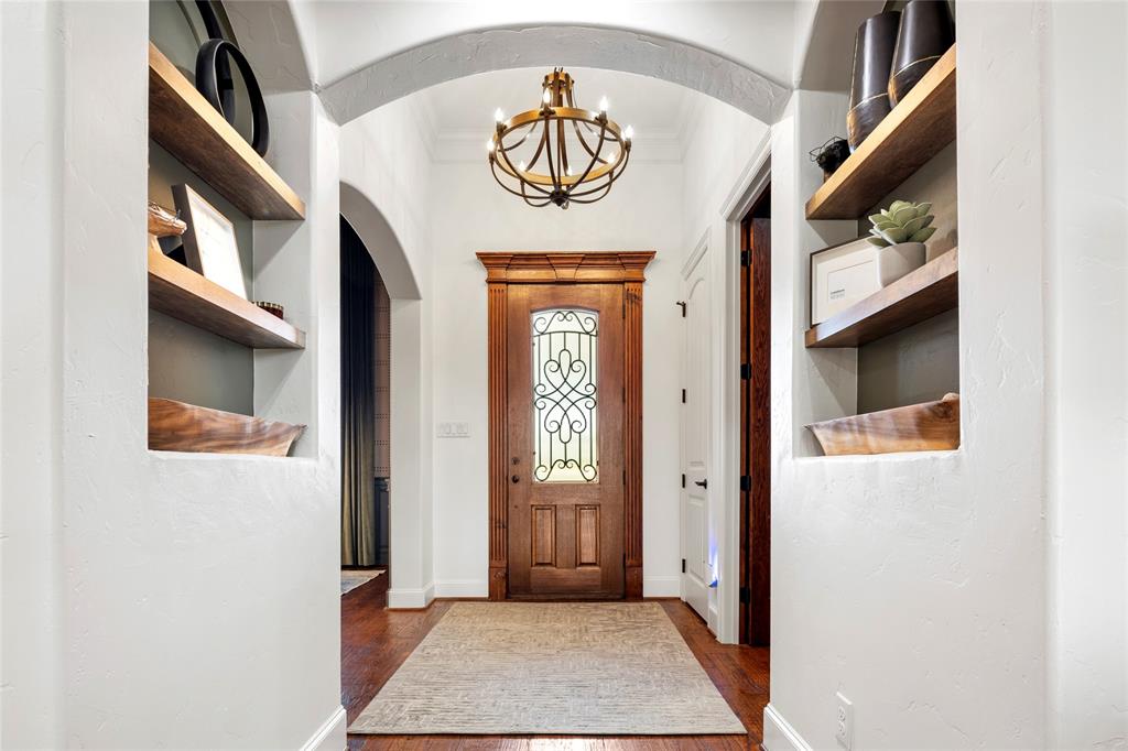 700 Frenchtown Road Argyle, TX 76226 - Photo 5 of 40 Grand entryway greets you with built-in shelving, an impressive Office with rich wood cabinetry and a formal dining that is warm and welcoming.
