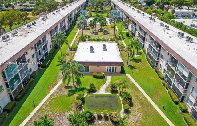 4502 North Federal Highway, Unit 336D Lighthouse Point, FL 33064 - Photo 1 of 20 a view of an outdoor space with a swimming pool