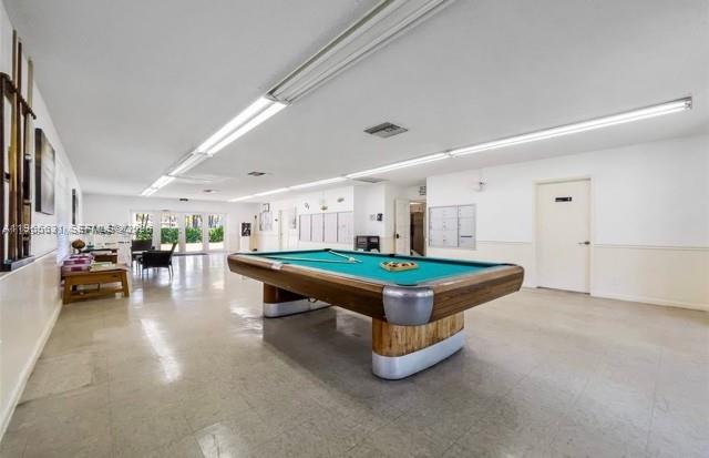 4502 North Federal Highway, Unit 336D Lighthouse Point, FL 33064 - Photo 16 of 20 a room with pool table and furniture