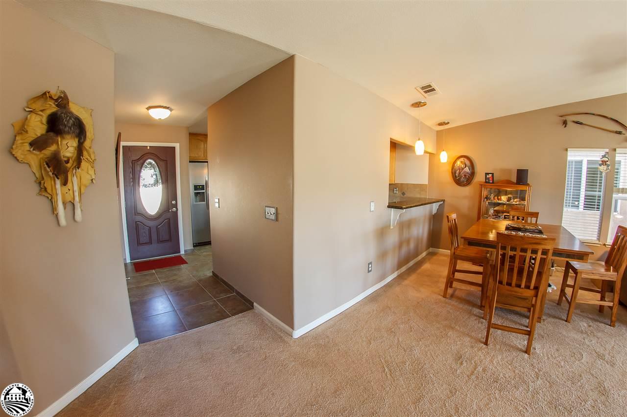 2112 Quail Hill Road Copperopolis, CA 95228 - Photo 13 of 22 a view of a livingroom and a dining room with furniture