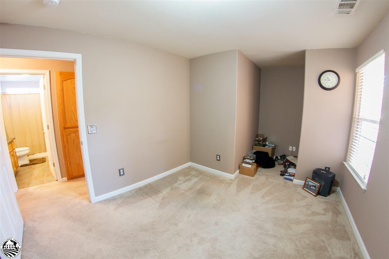 2112 Quail Hill Road Copperopolis, CA 95228 - Photo 15 of 22 an empty room with windows and closet