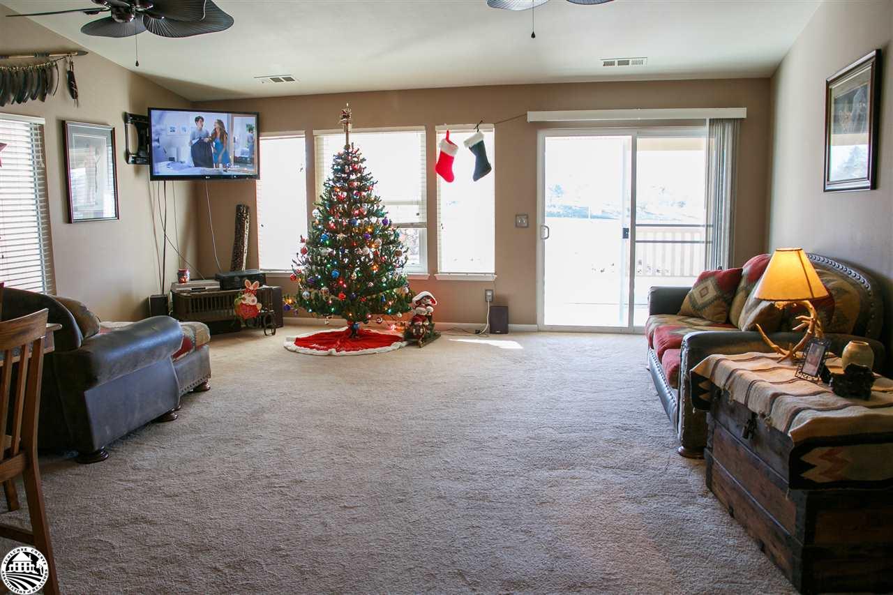 2112 Quail Hill Road Copperopolis, CA 95228 - Photo 3 of 22 a living room with furniture toys and a large window