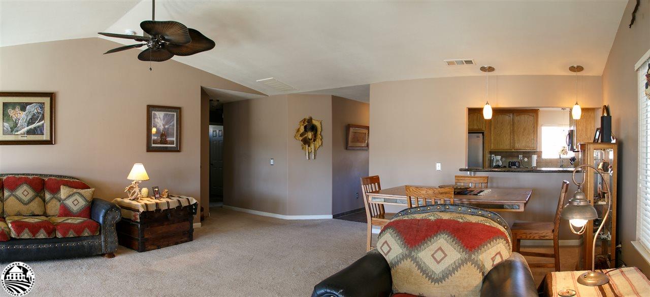 2112 Quail Hill Road Copperopolis, CA 95228 - Photo 4 of 22 a bedroom with a bed and a chandelier