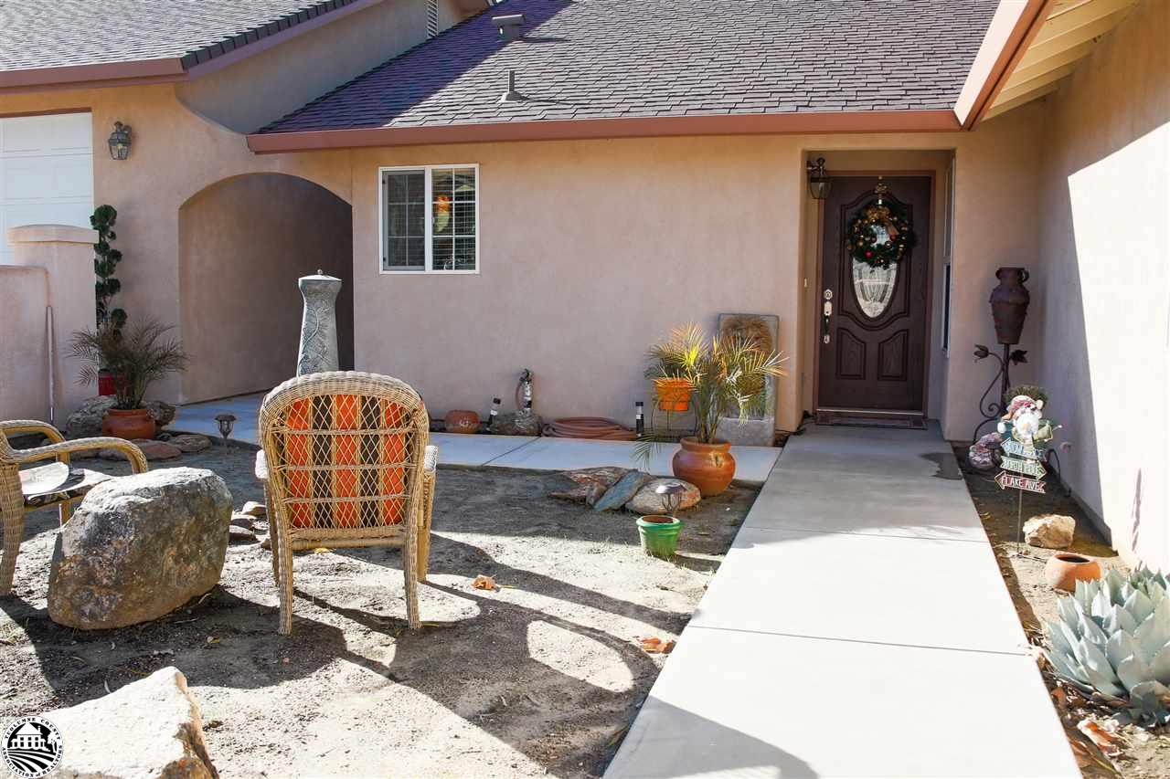2112 Quail Hill Road Copperopolis, CA 95228 - Photo 5 of 22 a living room with a rug