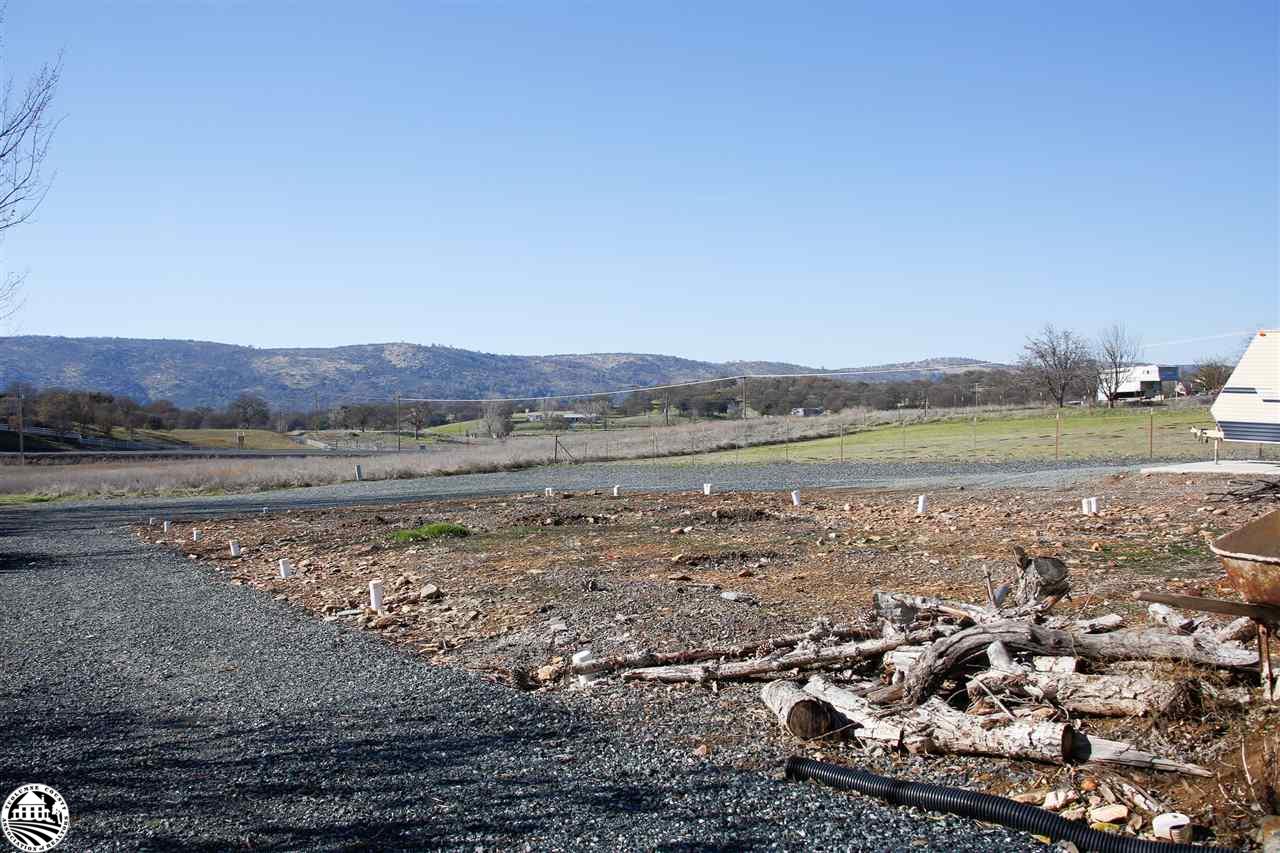 2112 Quail Hill Road Copperopolis, CA 95228 - Photo 6 of 22 a view of a town with mountains in the background