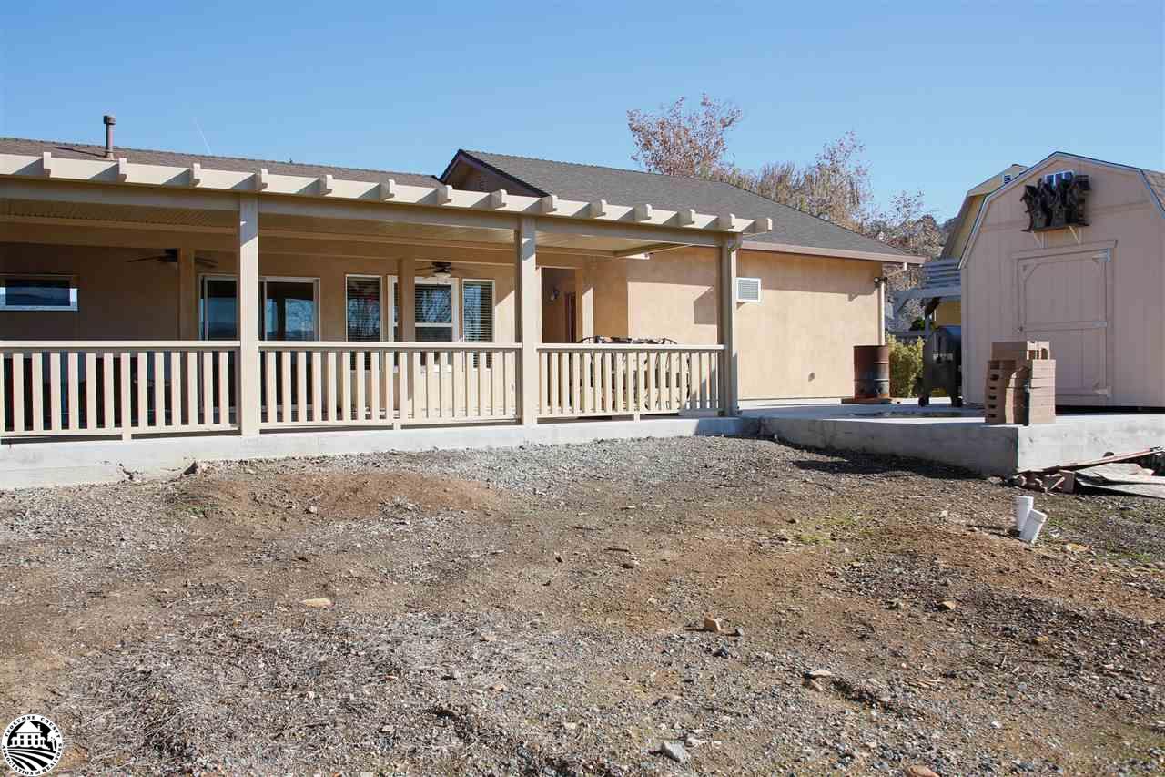 2112 Quail Hill Road Copperopolis, CA 95228 - Photo 7 of 22 a view of a house with a backyard