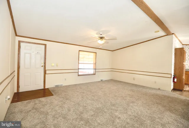 a view of a livingroom with an empty space