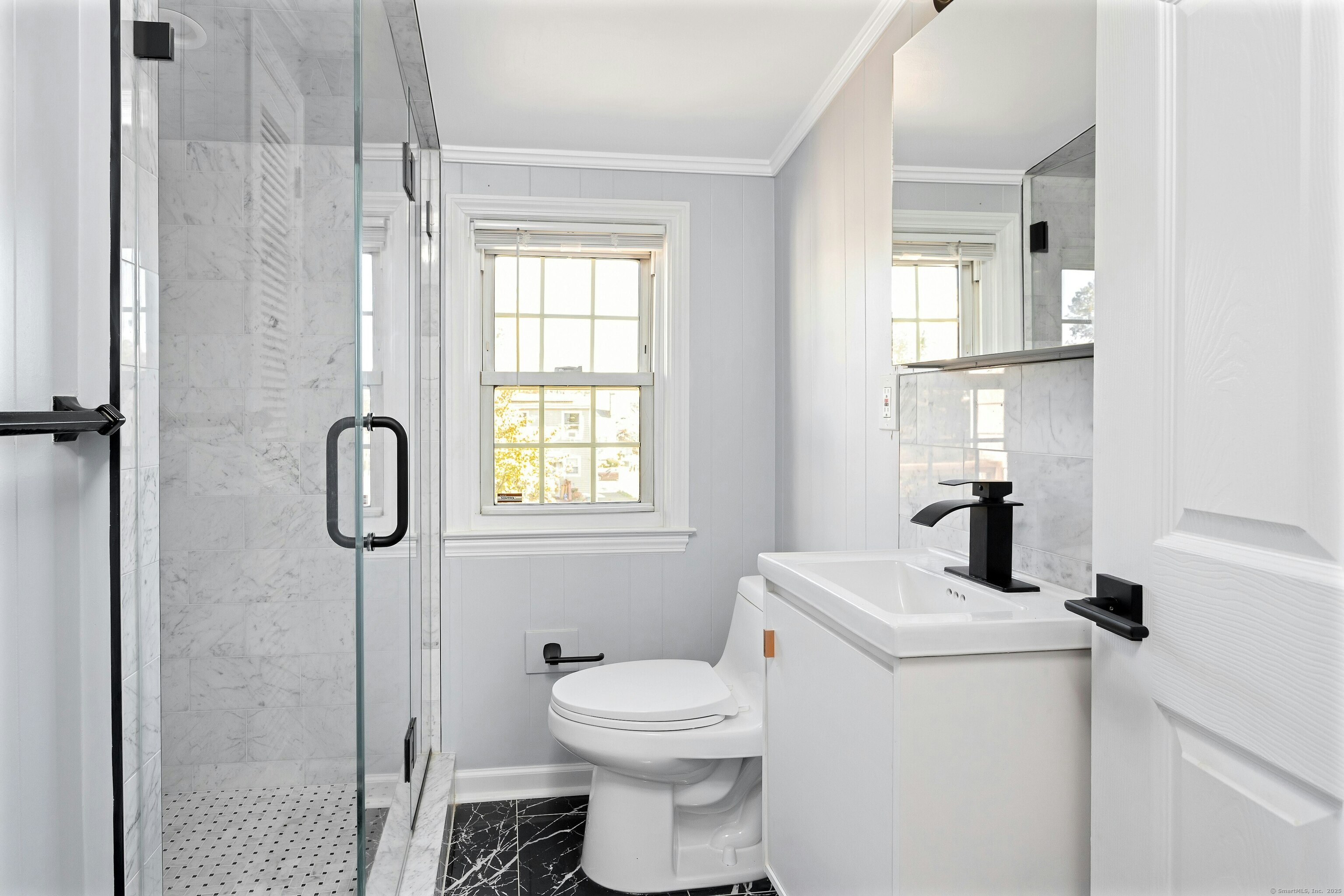 80 Victory Street Stamford, CT 06902 - Photo 9 of 12 a bathroom with a toilet sink and shower