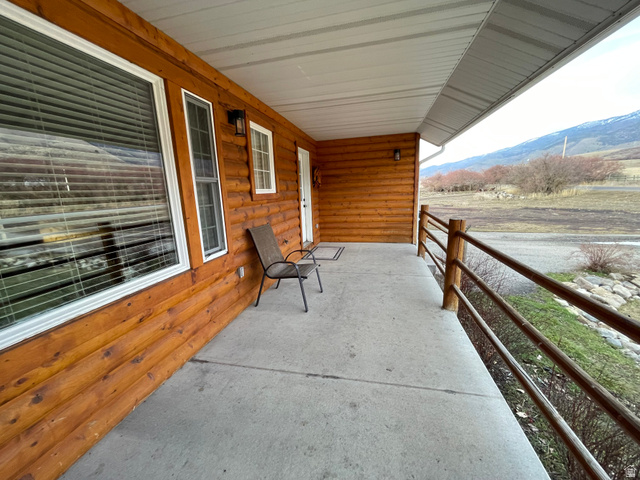 333 Lago Liberty Road Grace, ID 83241 - Photo 17 of 35 View of patio featuring a mountain view