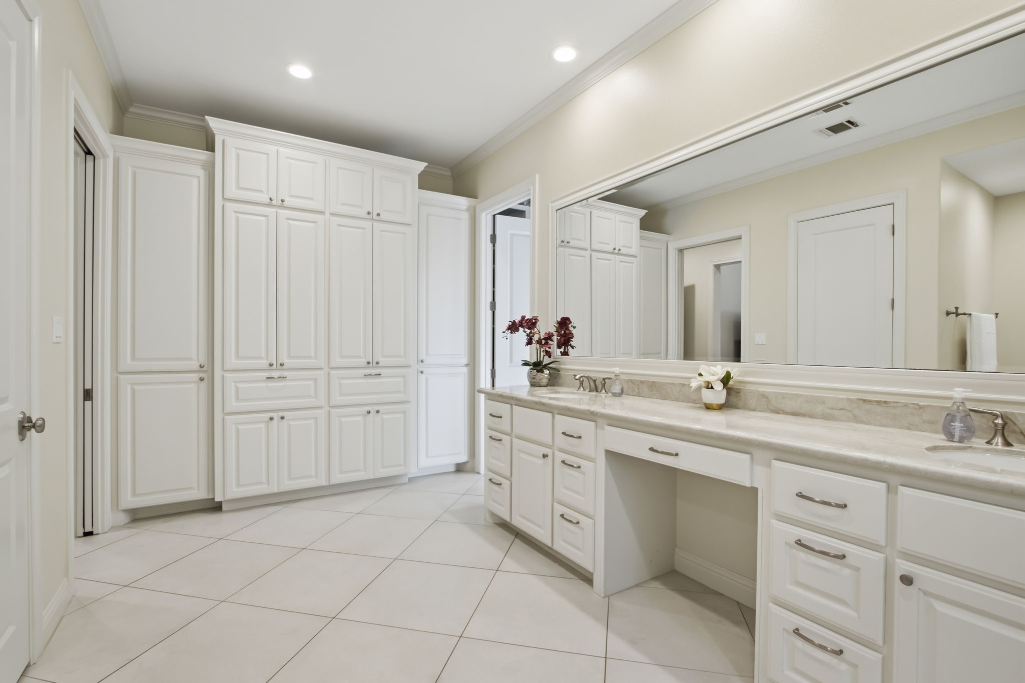 36702 Deer Valley Magnolia, TX 77355 - Photo 23 of 46 a spacious bathroom with a granite countertop sink and a mirror