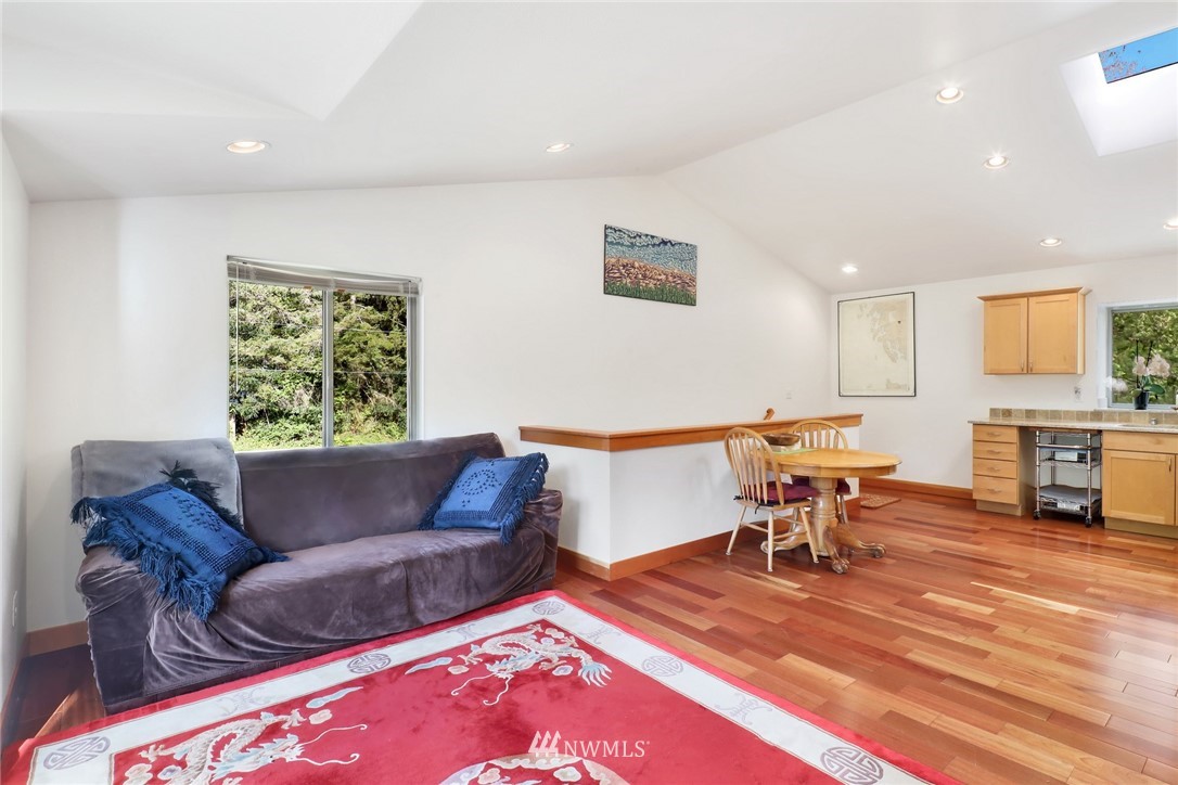 4760 Mission Road Bellingham, WA 98226 - Photo 18 of 40 a living room with furniture and a table
