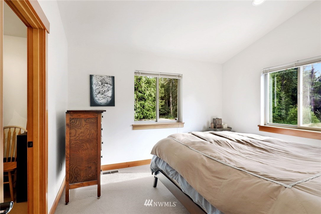 4760 Mission Road Bellingham, WA 98226 - Photo 22 of 40 a bedroom with a bed and a window