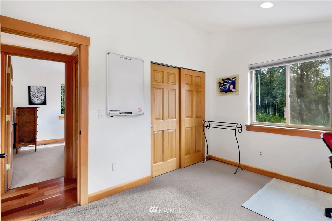 4760 Mission Road Bellingham, WA 98226 - Photo 23 of 40 an empty room with windows and closet